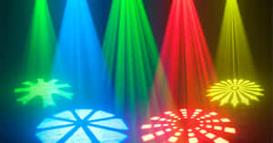 Glowing Dj Booth Against A Dark Concert Background Wallpaper