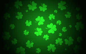 Glowing Green Shamrocks Background Wallpaper