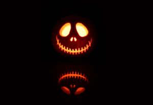 Glowing Jack O Lantern Reflection Wallpaper