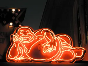Glowing Neon Buddha Sign Wallpaper