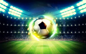 Glowing Soccer Ball At Football Field Stadium Wallpaper