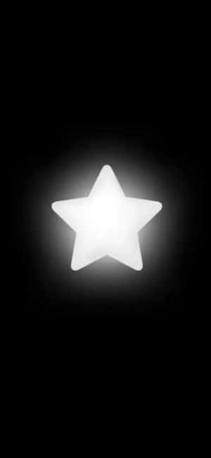 Glowing Star Black Background Wallpaper