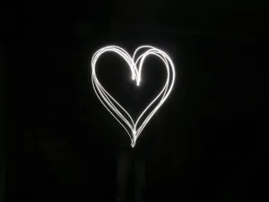 Glowing White Heart Aesthetic Wallpaper