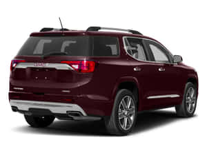 Gmc Acadia Driving On A Sunny Day Wallpaper