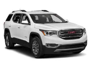 Gmc Acadia Driving Through A Scenic Route Wallpaper