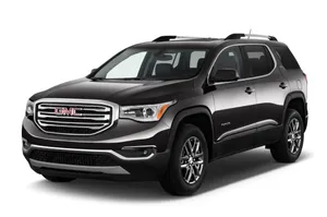 Gmc Acadia Driving Through Scenic Mountain Road Wallpaper