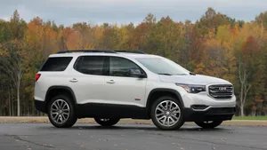 Gmc Acadia On A Scenic Drive Wallpaper