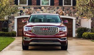 Gmc Acadia On Scenic Road Wallpaper