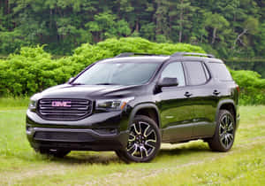 Gmc Acadia On The Road Wallpaper