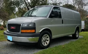 Gmc Savana Cargo Van Driving On The Highway Wallpaper