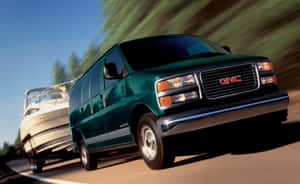 Gmc Savana Cargo Van On The Road Wallpaper