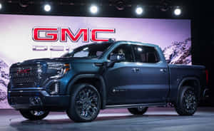 Gmc Sierra Heavy-duty Truck Parked Outdoors Wallpaper