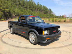 Gmc Syclone Exhibiting Its Classic Style And Power Wallpaper