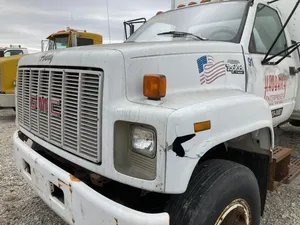 Gmc Topkick Heavy-duty Truck On The Road Wallpaper