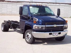 Gmc Topkick Monster Truck On A Dirt Road Wallpaper