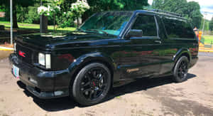 Gmc Typhoon - A Powerhouse On Wheels Wallpaper