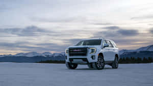 Gmc Yukon On A Scenic Route Wallpaper