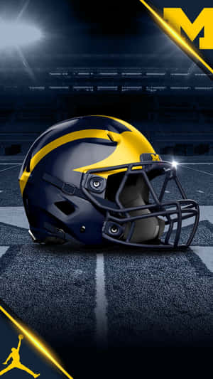 Go Blue! The Michigan Wolverines Logo And Stadium Roaring With Pride. Wallpaper