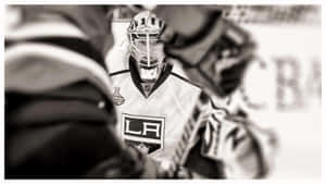 Goaltender Jonathan Quick #32 Of The Los Angeles Kings Blocks A Shot Wallpaper