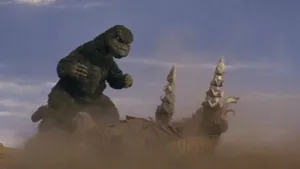 Godzilla And Megalon Locked In A Fierce Battle Wallpaper