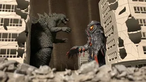 Godzilla Battles Hedorah In An Epic Showdown Wallpaper