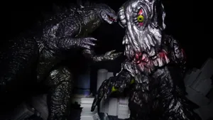 Godzilla Fighting Hedorah In An Epic Battle Wallpaper