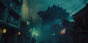 Godzilla Looming Over City Night Wallpaper