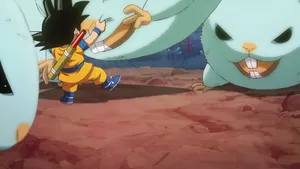 Goku Fighting Giant Creatures Wallpaper