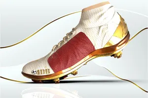 Gold Accented Soccer Cleat Wallpaper