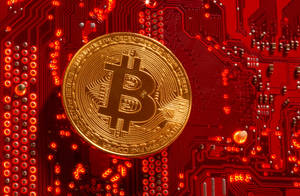 Gold Cryptocurrency Coin On Red Wallpaper