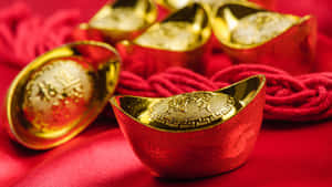 Gold Ingots For Wealth And Prosperity Wallpaper