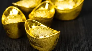 Gold Ingots On Black Surface Wallpaper