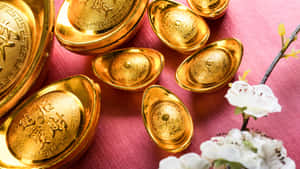 Gold Ingots With Floral Decoration Wallpaper