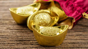 Gold Ingots With Red Pouch Wallpaper