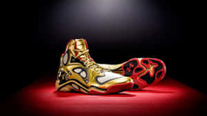 Gold Red Basketball Shoes Spotlight Wallpaper