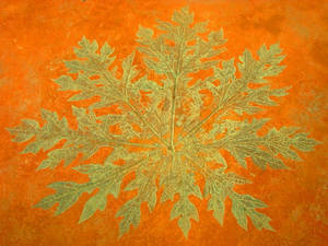 Gold Texture Leaf Against Orange Wallpaper
