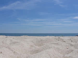 Golden Beach Sand At Sunset Wallpaper