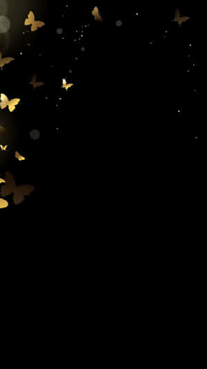 Golden Butterflieson Black Background Wallpaper