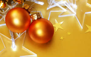 Golden Christmas Ornamentsand Stars Wallpaper