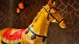 Golden Horse Statue Display Wallpaper