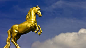 Golden Horse Statue Symbolism Wallpaper