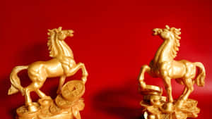 Golden Horse Statues Symbolism Wallpaper