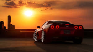 Golden Hour Cruising On Sunset Drive Wallpaper