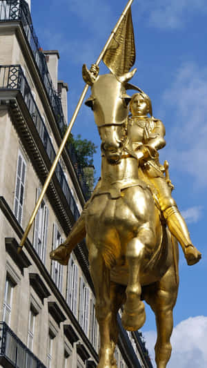Golden Joan Of Arc Statue Wallpaper