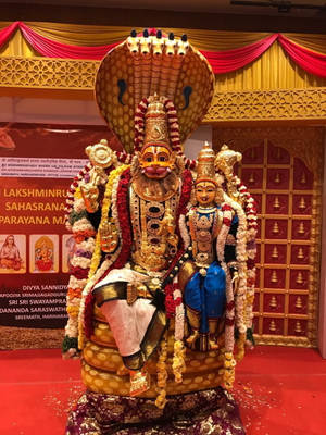 Golden Lakshmi And Narasimha Statue Wallpaper