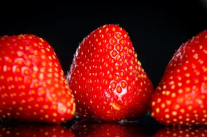 Golden Sunrise Illuminating A Peaceful Countryside Landscape Wallpaper