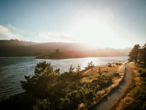 Golden Sunset Coastline Path Wallpaper