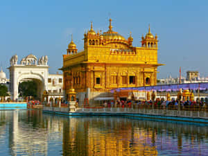 Golden Temple With Festival Banners Wallpaper