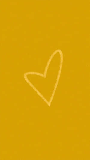 Golden Yellow Heart On A Black Background Wallpaper