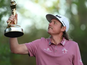 Golfer Celebrating Victoryat The Players Championship Wallpaper